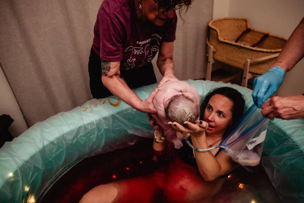 Baby moving out of birth pool after home birth